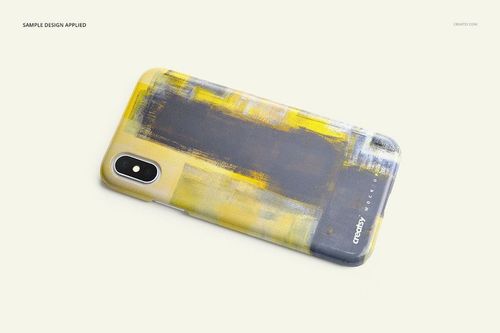 PSD mockup of an iPhone X case featuring a brushstroke pattern in yellow and black, displayed from above on a white surface.