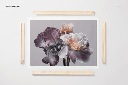 Rolled canvas print mockup featuring a floral design with purple and peach flowers, displayed with wooden frame pieces.