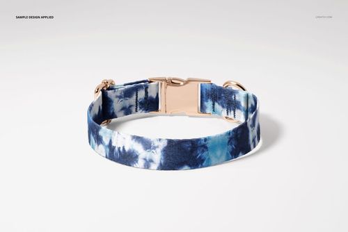 Front view of a dog collar mockup featuring a tie-dye blue and white design and metallic clasp on white surface.