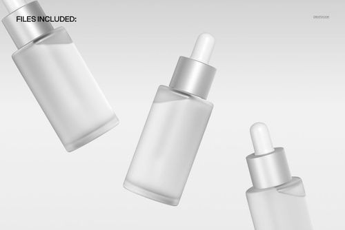 PSD mockup featuring a trio of glass dropper bottles with silver lids, displayed in a floating composition.