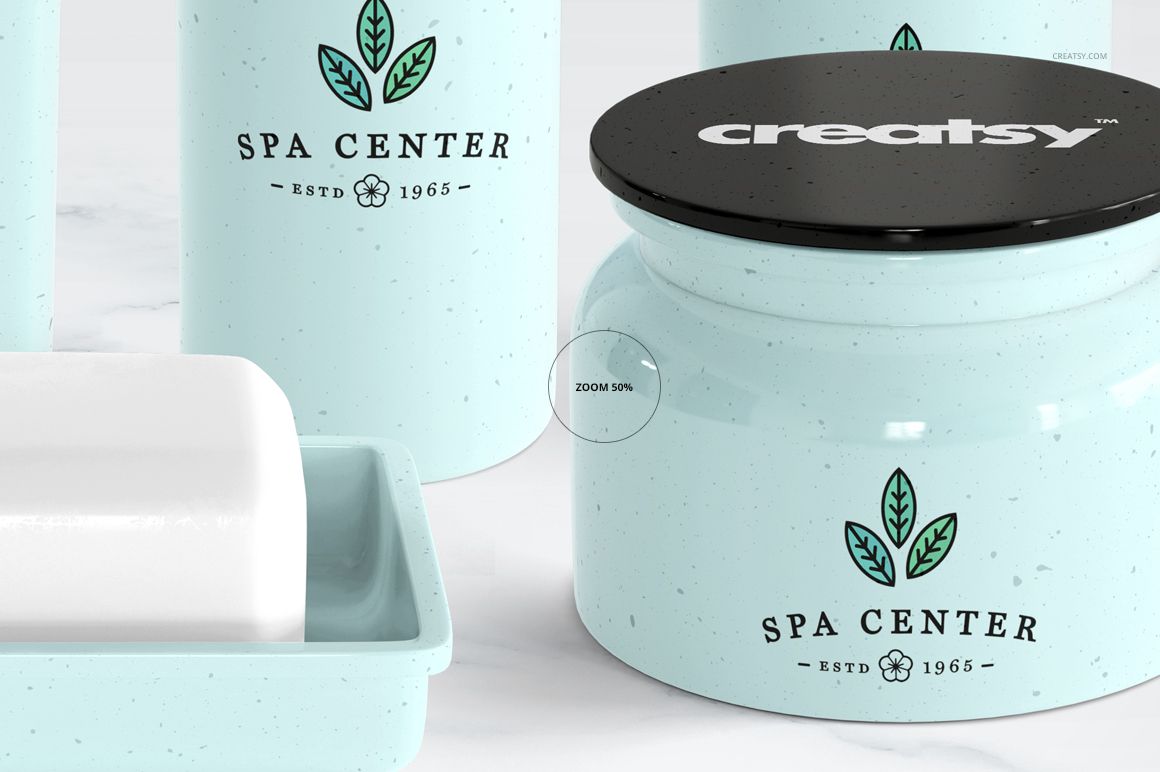 Bath accessories set mockup featuring light blue containers with black lids and a matching soap dish, front view on marble surface.