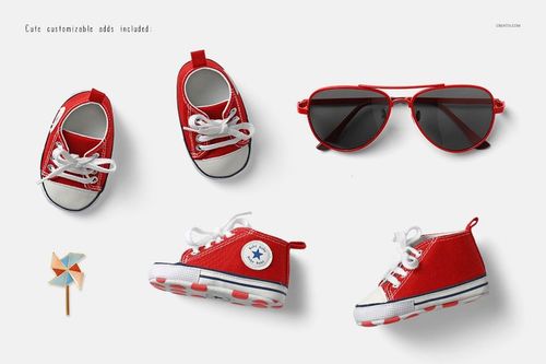 PSD mockup featuring a pair of red baby sneakers, aviator sunglasses, and a pinwheel, all displayed from above.