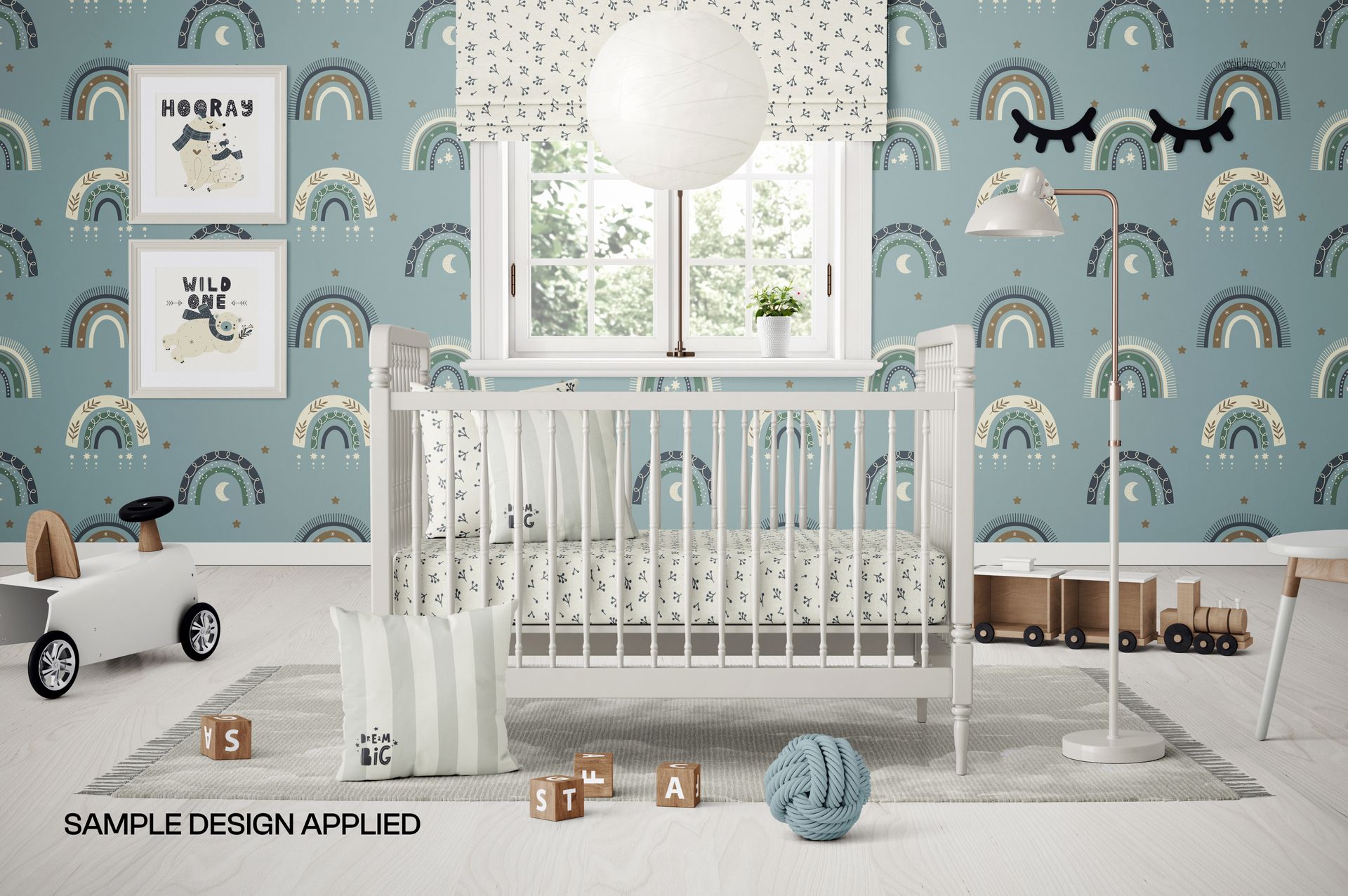 PSD mockup of a nursery featuring a vintage crib, patterned pillows, toy blocks, and blue rainbow-themed wallpaper.
