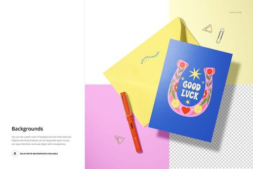 A5 card mockup featuring a blue card with vibrant artwork, yellow envelope, orange pen, and gold paper clips on a desk.