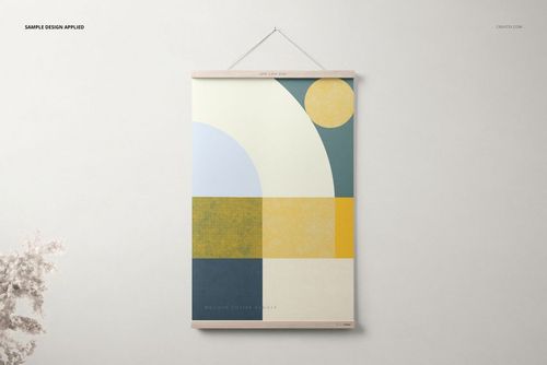 Wooden poster hanger mockup showing a vertical poster with bold geometric design, photographed from the front.