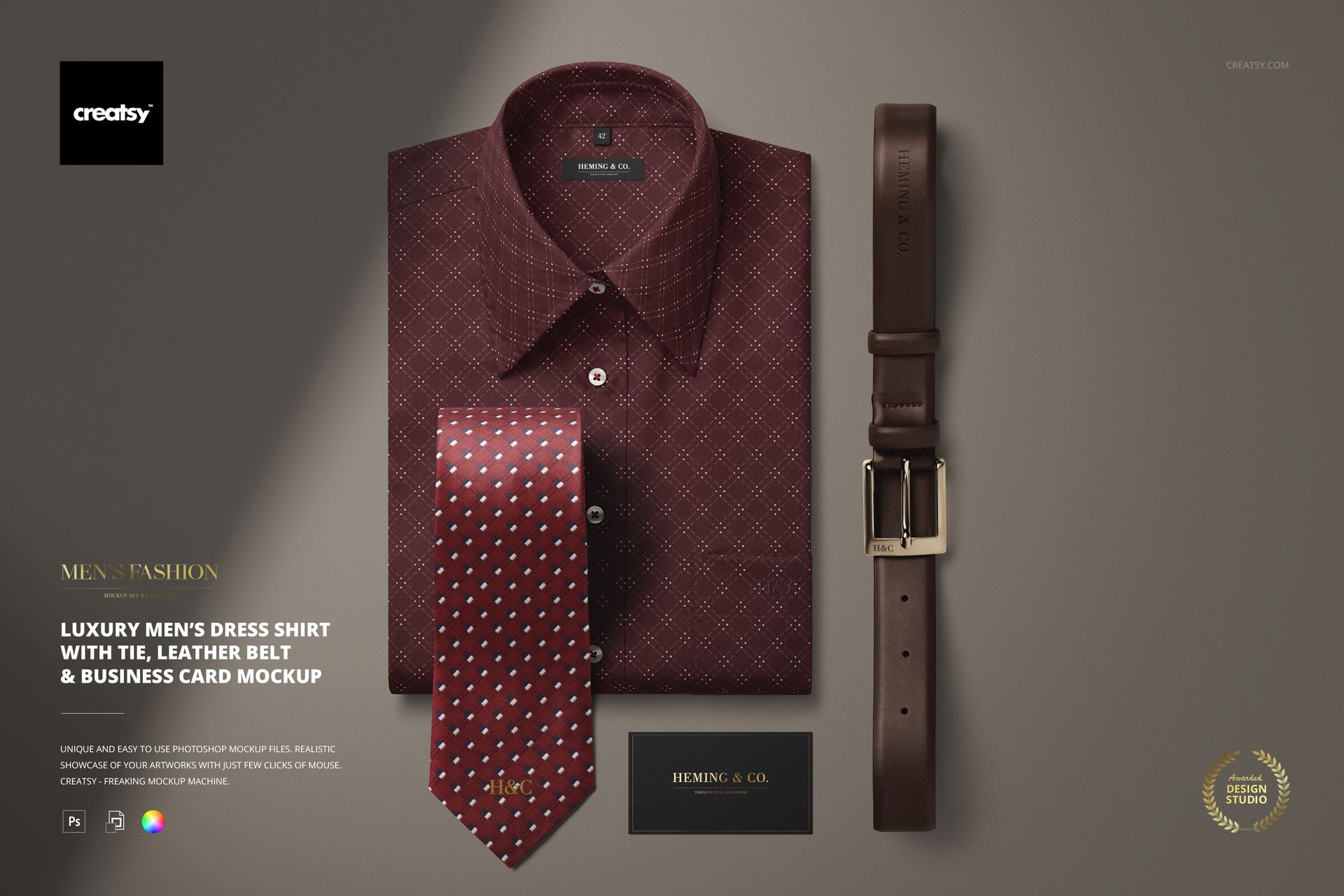 Men’s apparel PSD mockup showing a folded dress shirt, tie with dots, leather belt, and business card on a flat surface.
