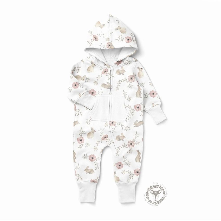 Baby fleece onesie mockup featuring a hooded suit with a soft floral and bunny pattern on a white background, shown flat.