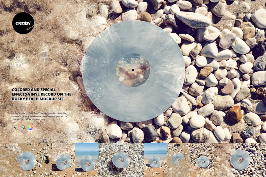 Translucent special effects vinyl record with marble pattern lying on sunlit pebbles in a beach mockup scene.