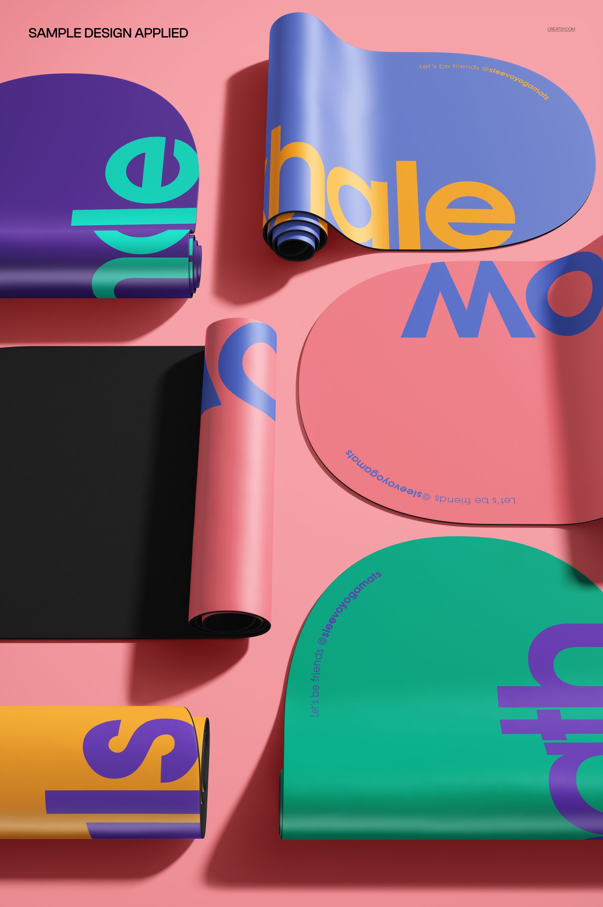 Top view of multiple oval yoga mats with bold colorful text designs, arranged on a pink surface in a PSD mockup.
