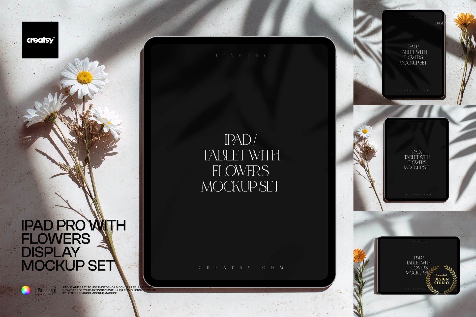 Front view of an iPad Pro mockup with a dark screen, surrounded by white daisies on a light surface.