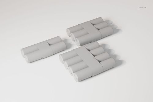 Three sets of changing pad paper rolls in a neutral color, arranged on a plain white surface with soft shadows.