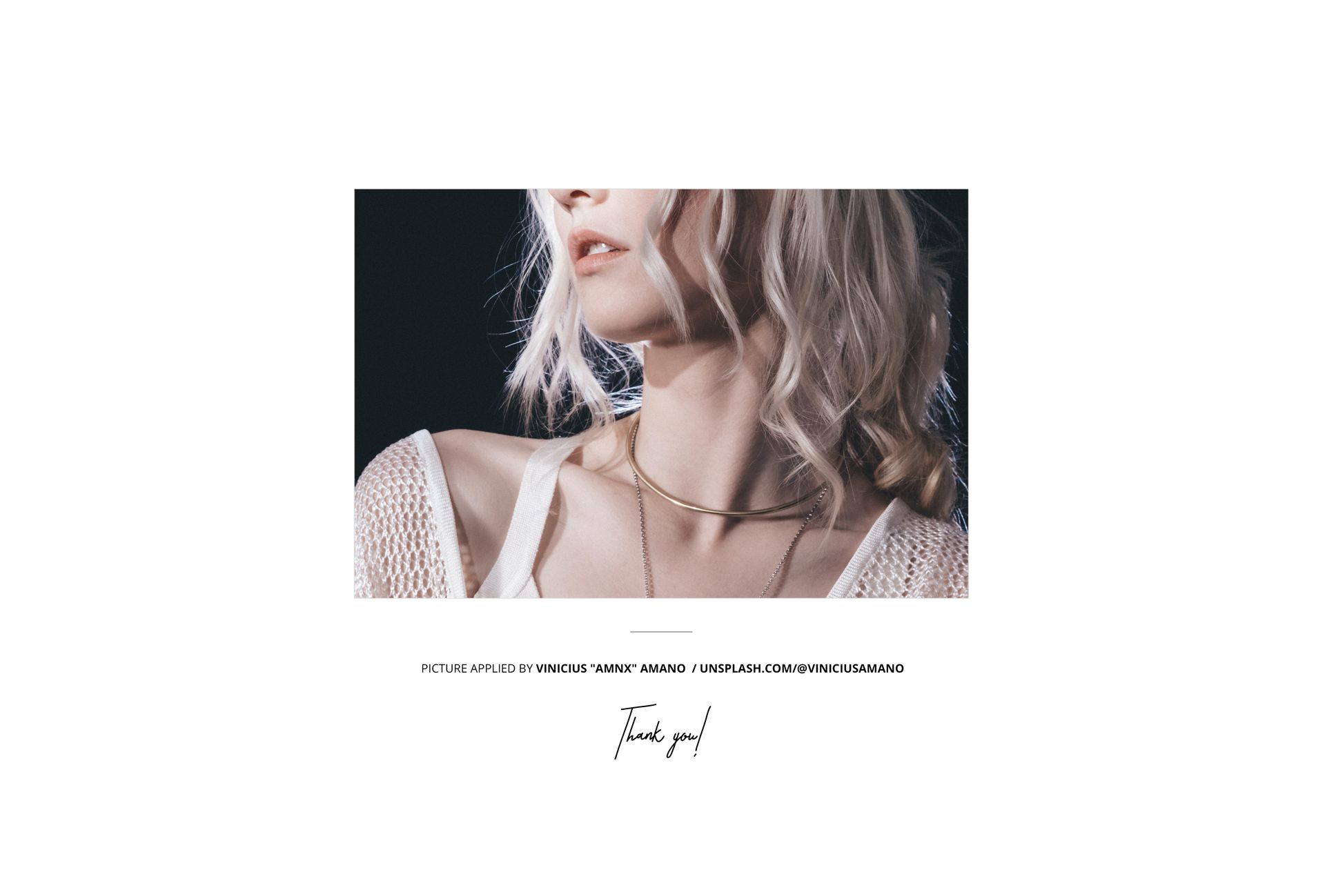 Poster mockup displayed against a wooden backdrop near a store entrance, featuring a close-up of a person with light hair and layered necklaces.