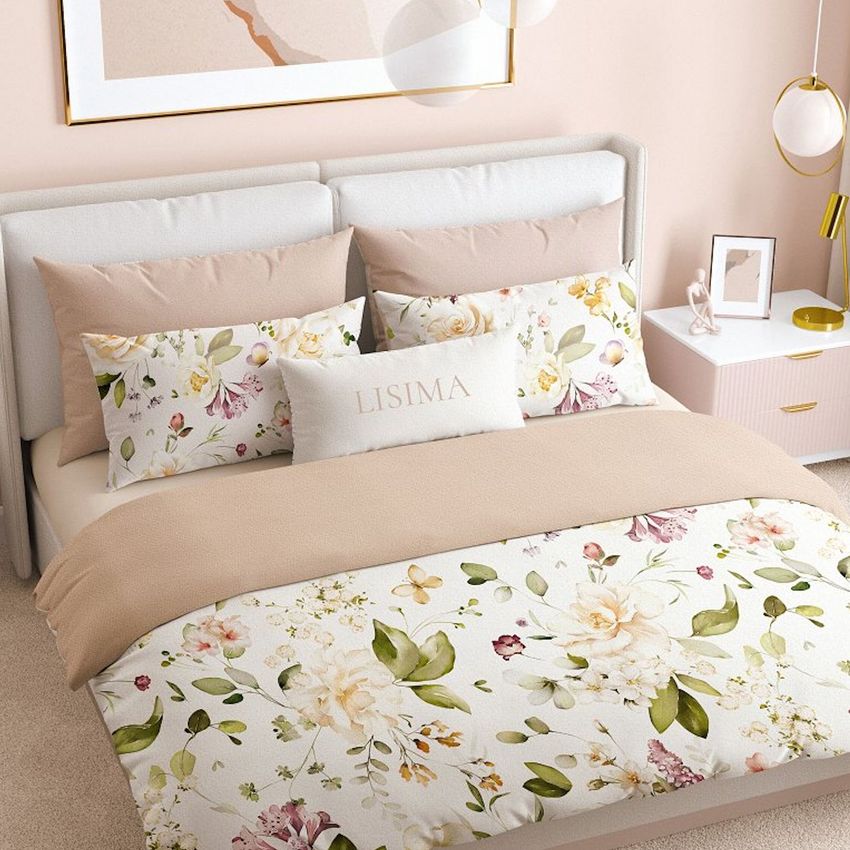 Bedding mockup in a bedroom scene featuring a floral duvet cover and pillows with white, green, and beige tones.
