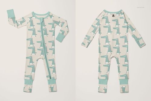 PSD mockup showing a baby pajama with zipper closure, light blue trim, and playful dinosaur print on both sides.