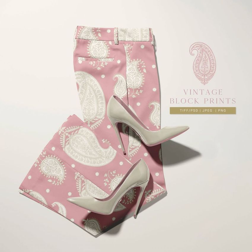Blazer trousers two-piece set mockup featuring pink pants with white paisley patterns, paired with light gray high heels on a neutral background.