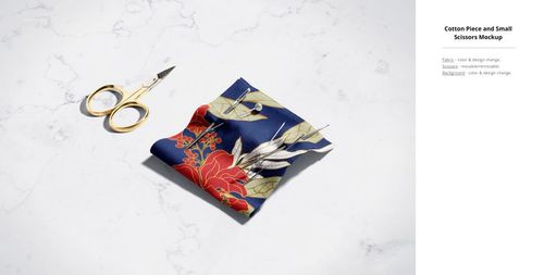 Cotton fabric mockup featuring a blue floral print, paired with small gold scissors on a light marble background.