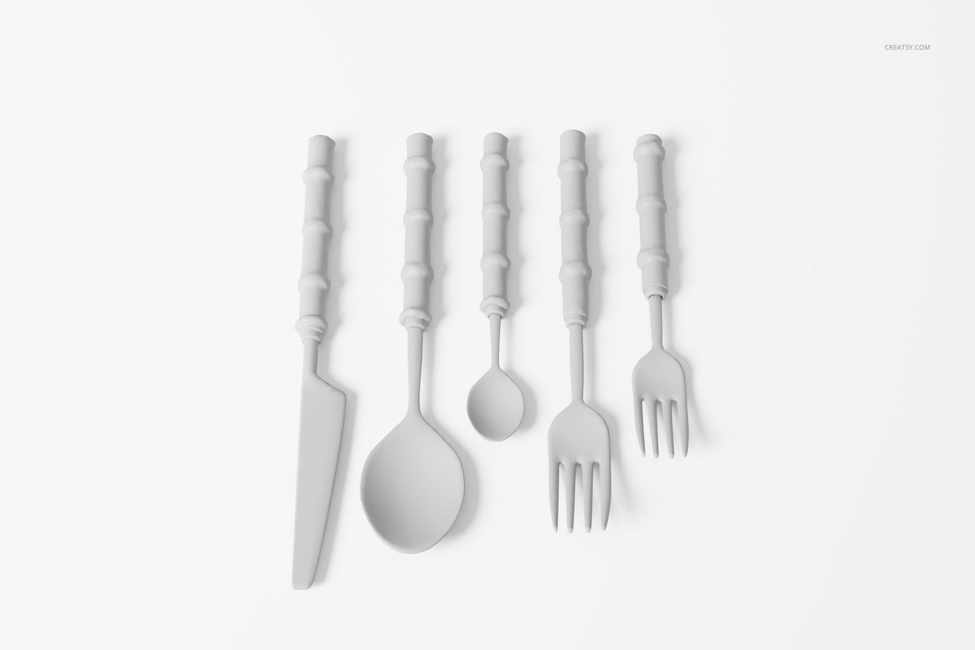 Set of five bamboo-style cutlery pieces in light gray, arranged in a row on a white surface, top view.