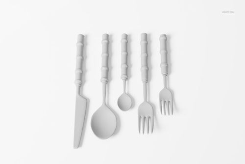 Set of five bamboo-style cutlery pieces in light gray, arranged in a row on a white surface, top view.