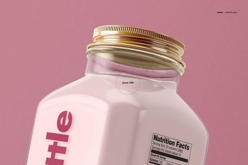 Glass bottle PSD mockup featuring a gold screw cap, pink contents, and visible nutrition facts label on a pink backdrop.