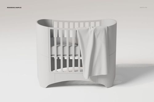 Modern white crib with rounded edges and vertical slats, draped with a large plain baby blanket, front view.