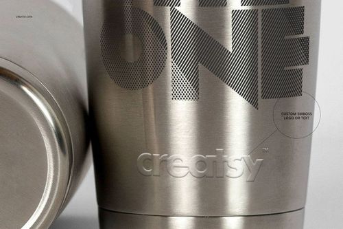Front view of two stainless steel tumblers, one upright and one lying down, with engraved and printed text designs.