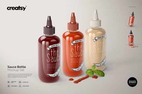 Front view of three sauce bottles in different colors with editable labels, shown in a PSD mockup set with basil leaves.