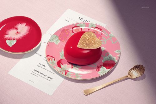 PSD mockup of a round cake plate featuring pink and green floral design, heart-shaped cake, and menu card.