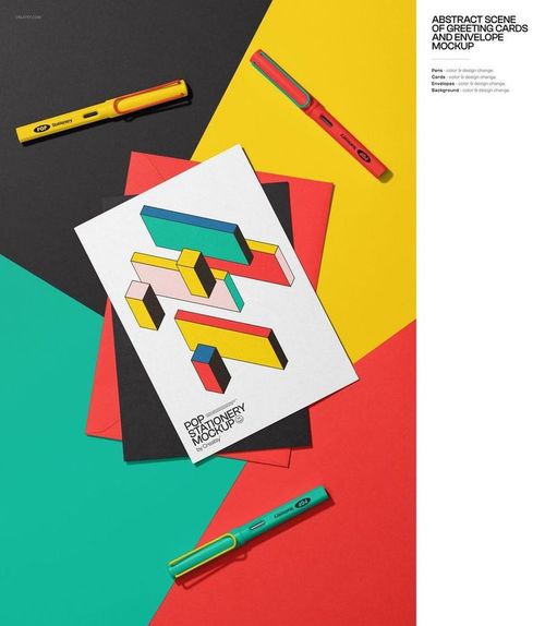 Top view of colorful stationery mockup with geometric greeting card, pens, and layered colored paper sheets.