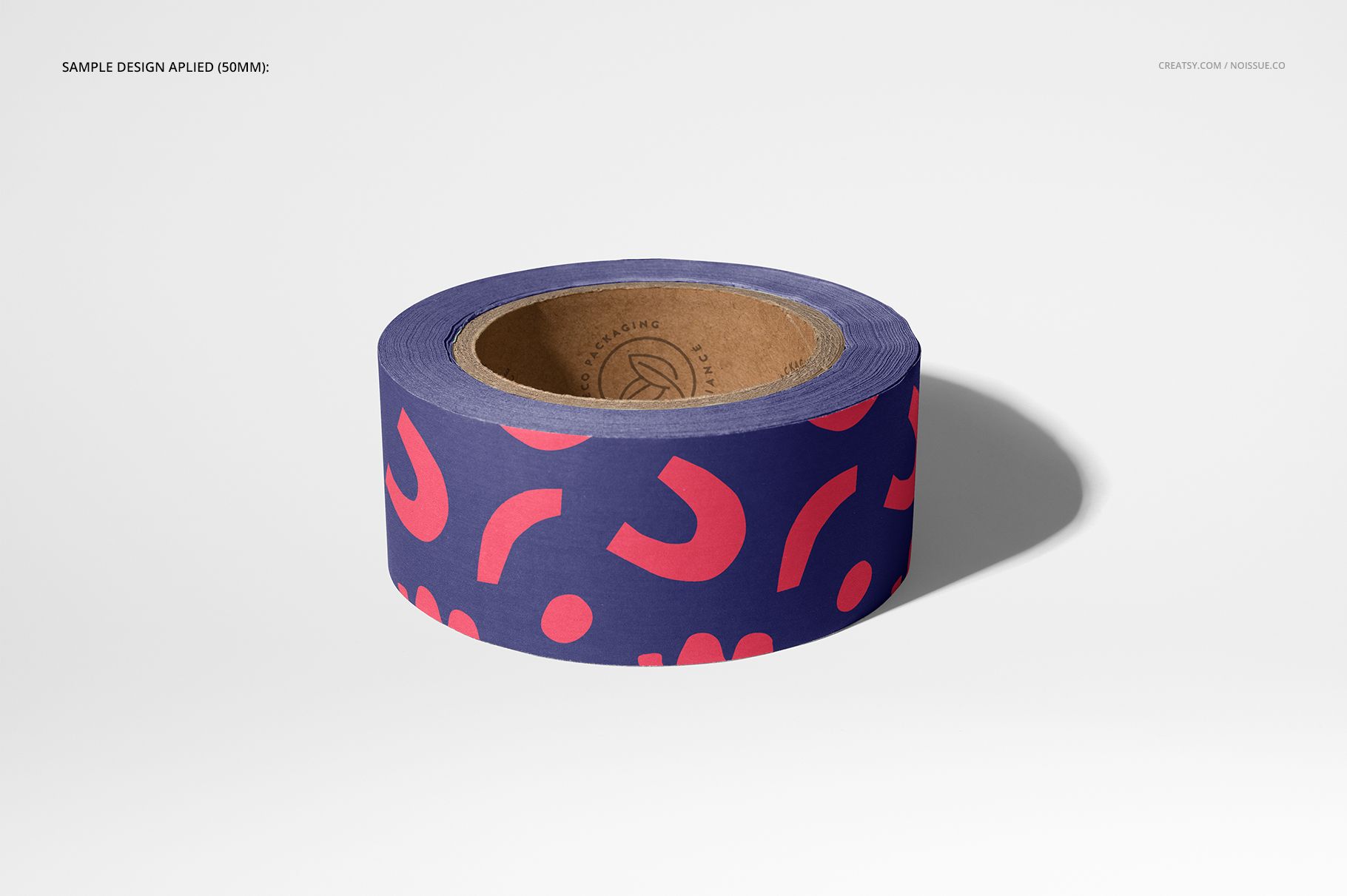 Noissue packing tape mockup showing a roll with vivid red abstract motifs on a purple background, isolated scene.