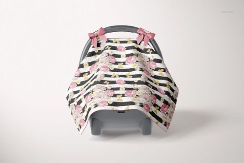 Baby car seat canopy mockup with pink flowers and black striped design, shown from the front with pink bows on top.