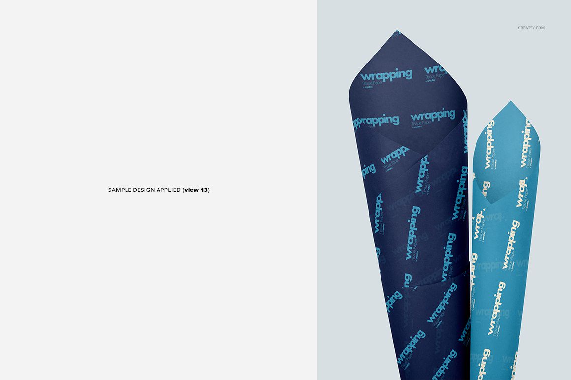 Wrapping tissue paper mockup featuring two blue patterned sheets, shown from a top perspective on a pale surface.