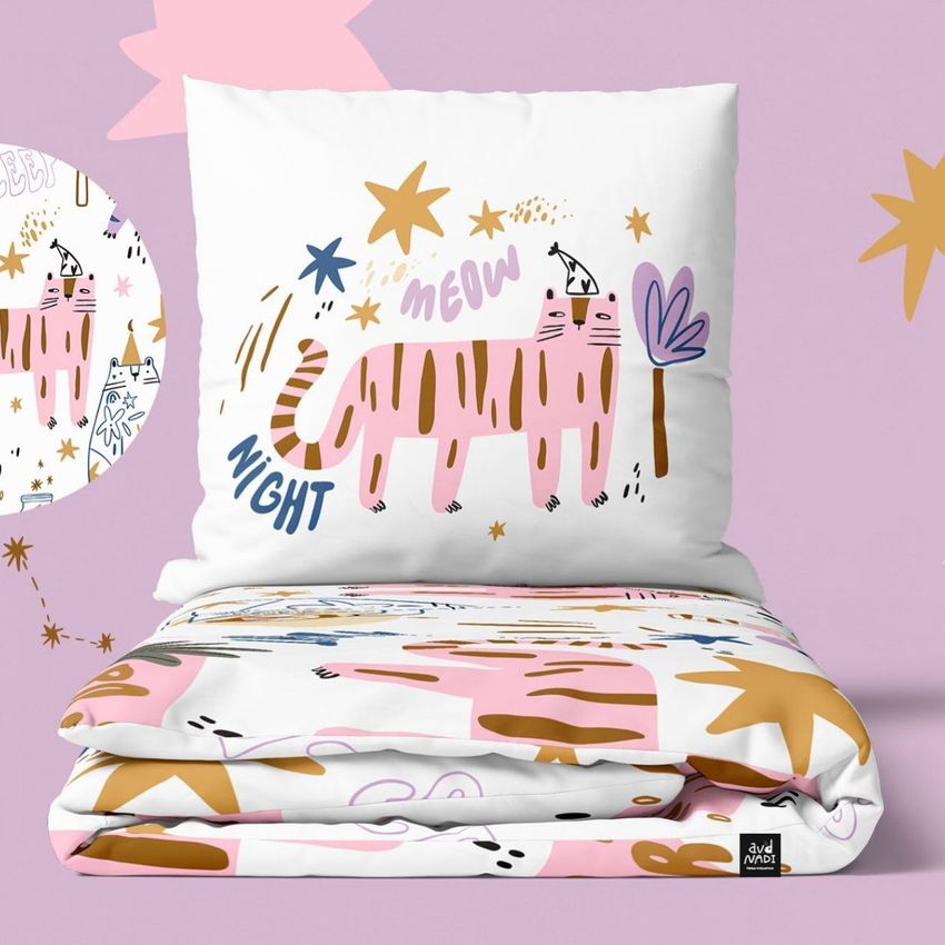 Bedding set mockup featuring a pillow and duvet with playful tiger illustrations, stars, and abstract shapes on a pink background.
