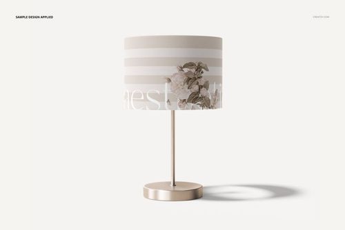 Lamp shade mockup featuring a cylindrical shape with beige and white horizontal stripes and floral design, front view.
