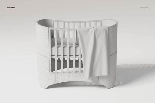 Front view of a white crib with rounded edges and a large baby blanket draped over the side in a minimal scene.