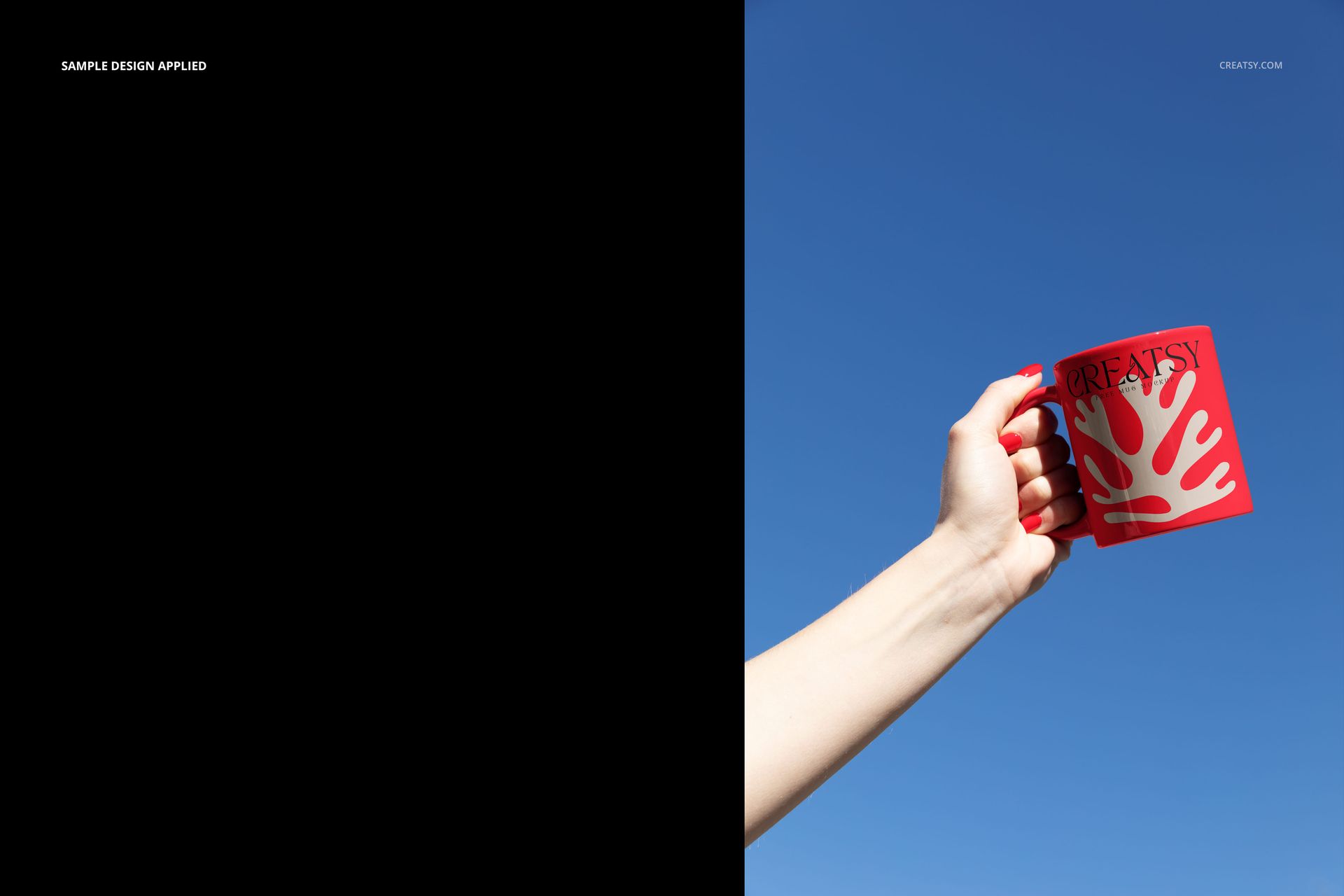 Red ceramic mug featuring a white graphic design, held by a hand outdoors with blue sky background, mockup style.
