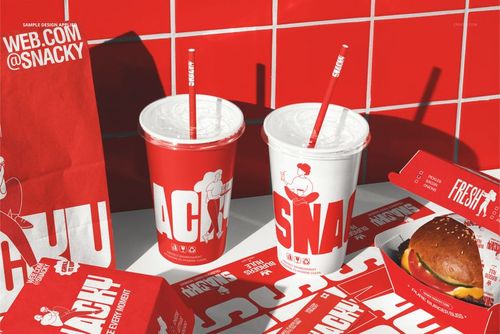 Front view of burger branding packaging mockup with red and white cups, burger box, paper bag, and wrappers on a tiled surface.