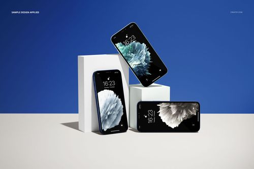 iPhone 12 mockup set featuring three smartphones with abstract screen designs on white cubes and a blue wall.
