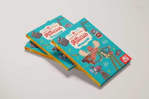 PSD mockup showing three illustrated hardcover books with buckram cloth covers, displayed on a neutral background.