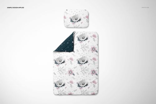 Mockup of a baby bedding set including a pillow and quilt, displaying playful animal and botanical designs, top perspective.