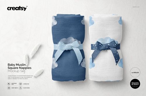 PSD mockup showing two baby muslin nappies, blue and white with cloud motifs, displayed side by side on a light background.
