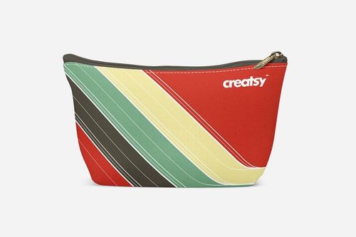 Make-up pouch PSD mockup featuring a zippered pouch with colorful diagonal stripes, shown against a neutral backdrop.