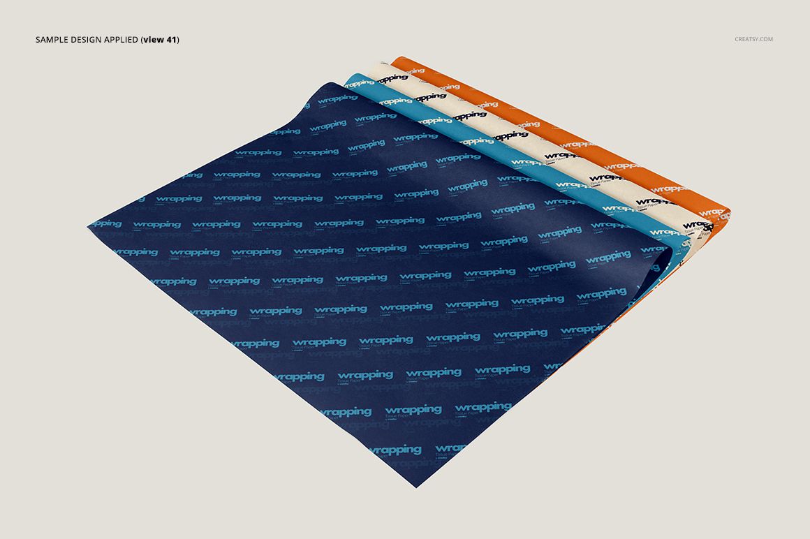 Front view of three sheets of wrapping tissue paper mockup with different colors and repeating text pattern on a light background.