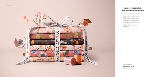 Cotton fabric mockup bundle displayed as neatly folded stacks with floral designs, ribbon accent, and minimal decorative props.