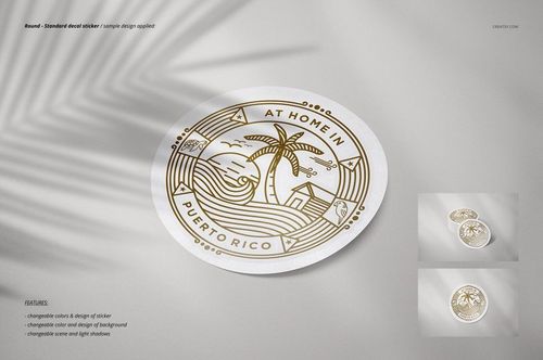 Close-up of circular sticker mockup with tropical illustration in gold, displayed on a neutral background with soft shadows.
