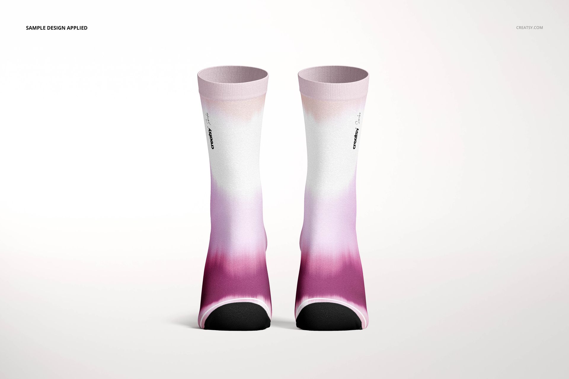 Pair of socks mockup featuring a soft pink to white gradient design, shown upright against a light backdrop.