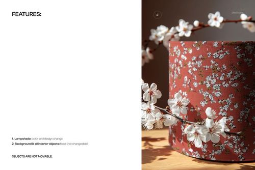PSD mockup showing a drum-shaped lampshade wrapped in a floral blossom design, with realistic branch details in a home setting.