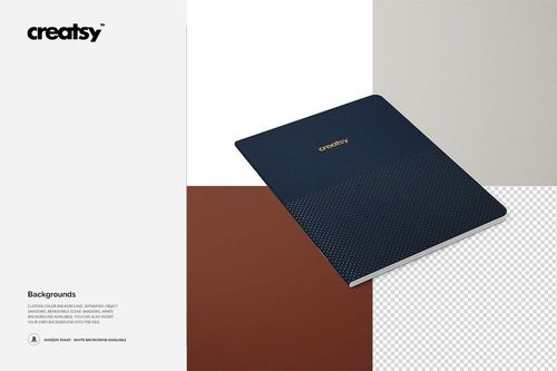 A5 notebook mockup featuring a dark blue cover with a small dotted design, displayed on a multi-color background.