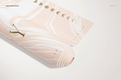 Yoga mat mockup showing a partially rolled mat with soft pastel colors and moon phase motifs on a neutral background.