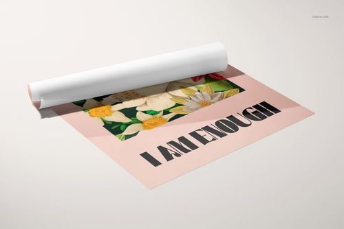 Glossy PVC poster mockup featuring a rolled edge, floral artwork in the center, and bold text on a pale background.