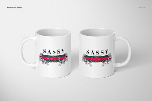 Two white 11oz mugs with handles, featuring a bold SASSY text and striped graphic, shown on a plain surface.